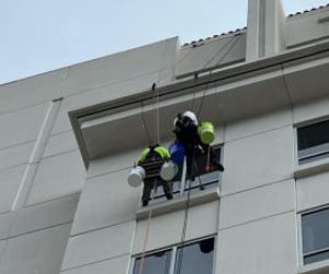 commercial restoration services – squeegee squad – men repeling