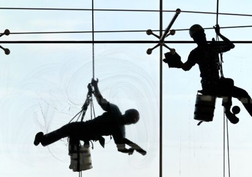 Window Cleaning & Pressure Washing Services - Squeegee Squad - commercial high rise window cleaning services