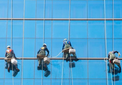 Window Cleaning & Pressure Washing Services - Squeegee Squad - commercial high rise window cleaning services